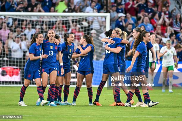 Women's National Team defender Alana Cook is congratulated by teammates after scoring her first goal as a member of the U.S. National tea during an...