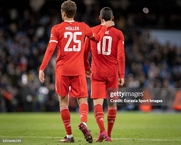 Thomas Müller and Leroy Sane of Bayern Munich leave field after the UEFA Champions League quarterfinal first leg match between Manchester City and FC...