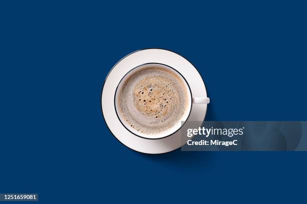americano coffee with crema on blue - blue cup stock pictures, royalty-free photos & images