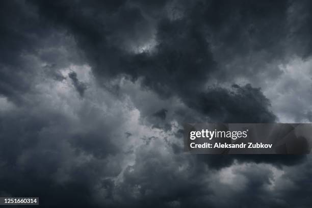 grey and black clouds in the sky. cloudy weather before rain or storm. - festival float stock pictures, royalty-free photos & images