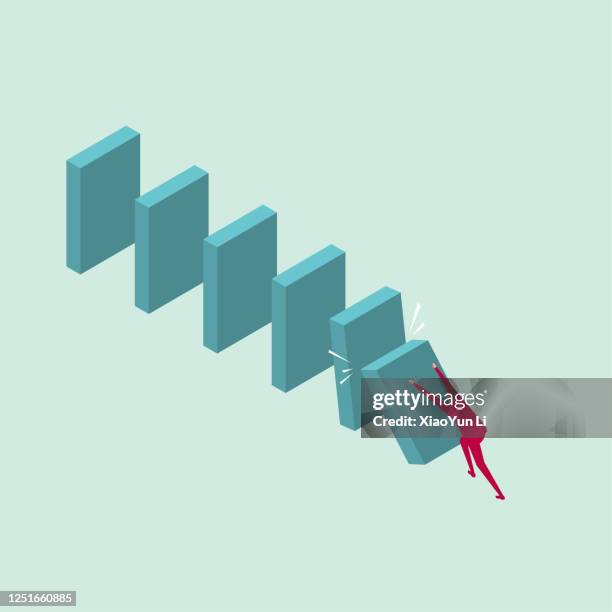 a businessman knocks down dominoes. - domino effect stock illustrations