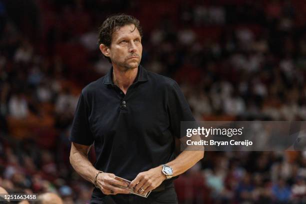 Head coach Quin Snyder of the Atlanta Hawks looks up at the scoreboard during the first quarter against the Miami Heat at Kaseya Center on April 11,...