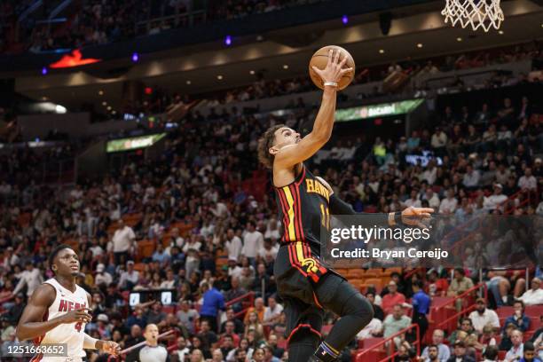 Trae Young of the Atlanta Hawks lays it up during the second quarter against the Miami heatat Kaseya Center on April 11, 2023 in Miami, Florida. NOTE...