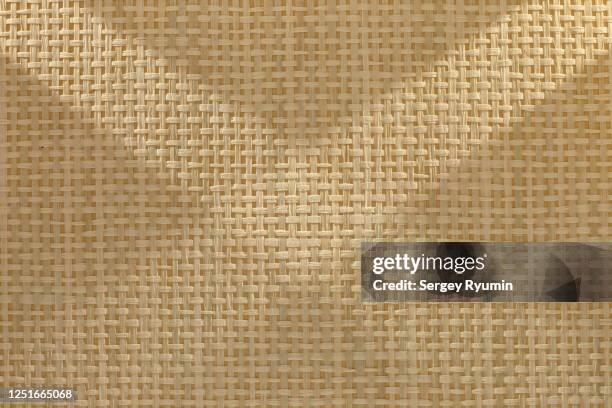 wicker straw texture with lighting - wicker mat stock pictures, royalty-free photos & images