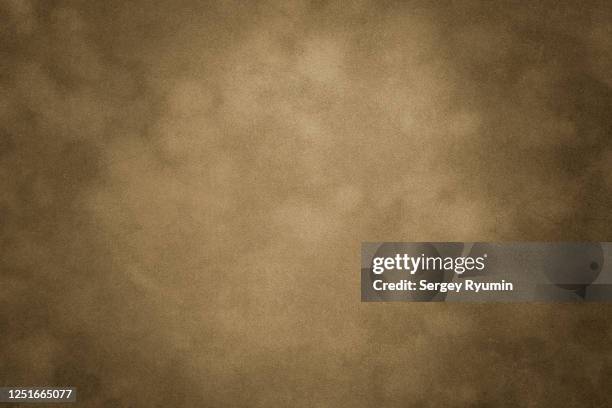 light brown velvet with lighting - bruine achtergrond stockfoto's en -beelden