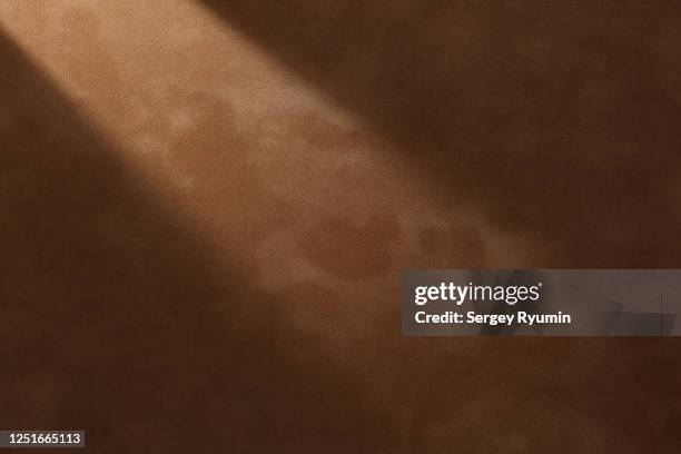brown velvet with lighting - braun stock-fotos und bilder