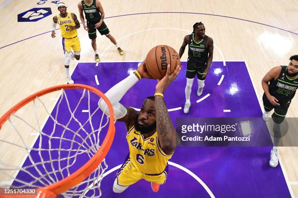 LeBron James of the Los Angeles Lakers dunks the ball during the game against the Minnesota Timberwolves during the 2023 Play-In Tournament on April...