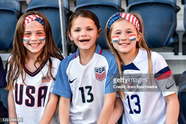 Young female fans show their support for the U.S. National Team during an international friendly game between the Republic of Ireland Woman's...