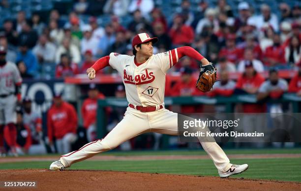 Starting pitcher Shohei Ohtani of the Los Angeles Angels pitches against the Washington Nationals during the first inning at Angel Stadium of Anaheim...