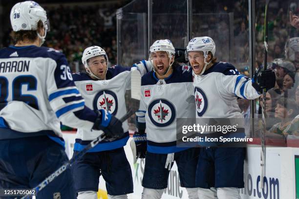 Winnipeg Jets center Mason Appleton celebrates with teammates after a goal during the NHL game between the Winnipeg Jets and Minnesota Wild, on April...