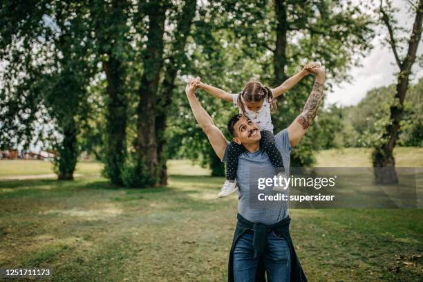 father and daughter spend quality time together - life insurance stock pictures, royalty-free photos & images