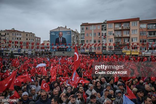 Supporters wave Turkish national flags as they attend a rally of Turkey's Republican People's Party Chairman and Presidential candidate Kemal...