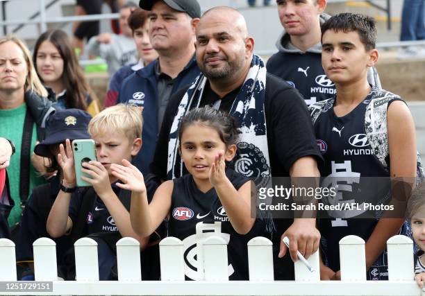 Fans watch during a Carlton Blues AFL training session at Unley Oval on April 12, 2023 in Adelaide, Australia.