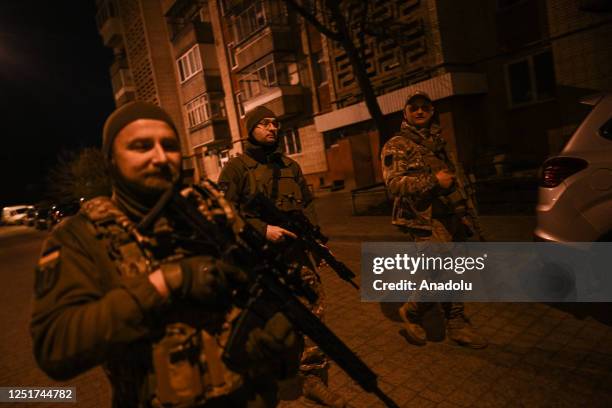 Members of the TARGET Civil Formation patrol the streets during the night curfew ban in Lviv, Ukraine on April 12, 2023. The TARGET civil formation...