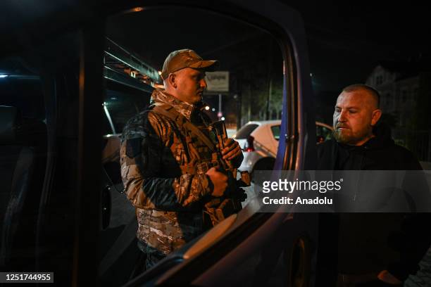 Members of the TARGET Civil Formation request ID documents and interrogates civilians as they broke the night curfew ban in Lviv, Ukraine on April...