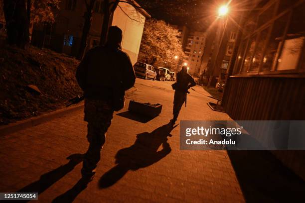 Members of the TARGET Civil Formation patrol the streets during the night curfew ban in Lviv, Ukraine on April 12, 2023. The TARGET civil formation...