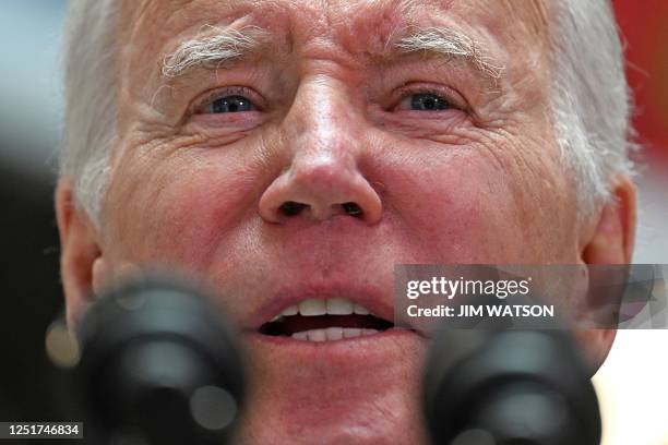 President Joe Biden delivers a speech on business development at Ulster University in Belfast on April 12 as part of a four day trip to Northern...