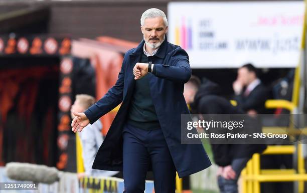 Dundee United manager Jim Goodwin checks his watch during a cinch Premiership match between Dundee United and Hibernian at Tannadice, on April 09 in...