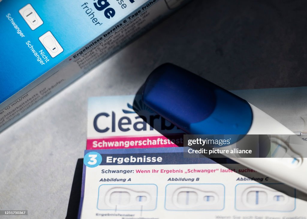 Test Pack Insert A positive pregnancy test is on a package insert. Photo: Hannes P ...