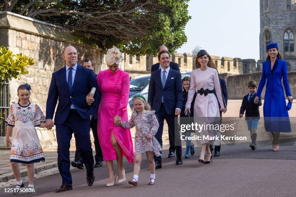 Mike Tindall and Zara Tindall, accompanied by Mia and Lena arrive with the Prince and Princess of Wales and other members of the Royal Family to...