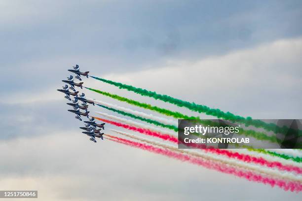 Italian Air Force aerobatic unit Frecce Tricolori planes spreads smoke with the colors of the Italian flag over the city during the swearing-in...