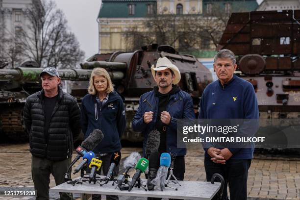 Senators Democrat Mark Kelly of Arizona, Republican Lisa Murkowski of Alaska, U.S. Country star Brad Paisley and Democrat Joe Manchin of West...