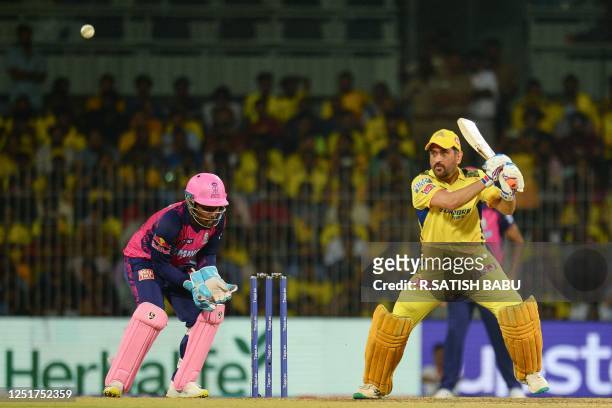Chennai Super Kings' captain Mahendra Singh Dhoni plays a shot during the Indian Premier League Twenty20 cricket match between Chennai Super Kings...