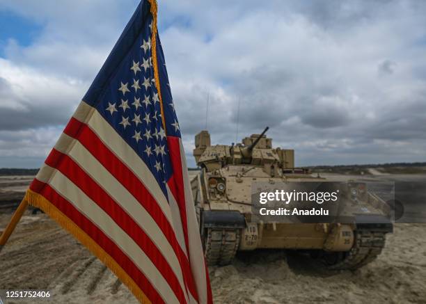 American soldiers of the 2nd Battalion, 70th Armor Regiment, 2nd Armored Brigade Comat Team, 1st Infantry Division supporting the 4th Infantry...