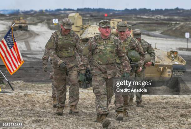 American soldiers of the 2nd Battalion, 70th Armor Regiment, 2nd Armored Brigade Comat Team, 1st Infantry Division supporting the 4th Infantry...