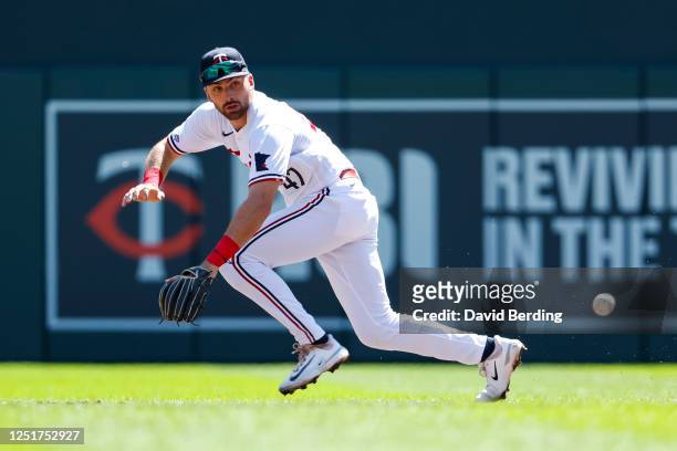 Edouard Julien of the Minnesota Twins fields a ball in his Major League debut in the third inning of the game against the Chicago White Sox at Target...