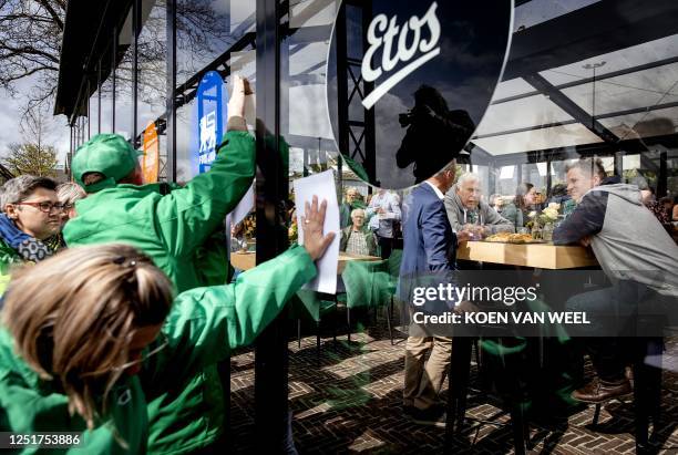 Demonstrators take action at the shareholders' meeting of Ahold Delhaize, in Zaandam on April 12, 2023. / Netherlands OUT / ZAANDAM - Demonstranten...