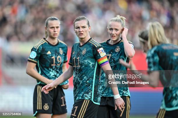 Klara Buehl of Germany, Alexandra Popp of Germany, Lea Schueller of Germany looks dejected during the Women's international friendly between Germany...