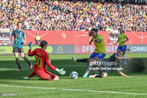 Felicitas Rauch of Germany, Goalkeeperin Ann-Katrin Berger of Germany, Gabi Nunes of Brazil and Sara Doorsoun of Germany battle for the ball during...