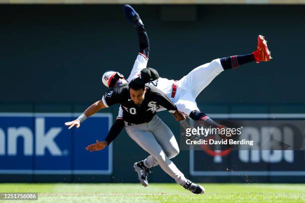 Byron Buxton of the Minnesota Twins collides with Lenyn Sosa of the Chicago White Sox in the seventh inning of the game at Target Field on April 12,...