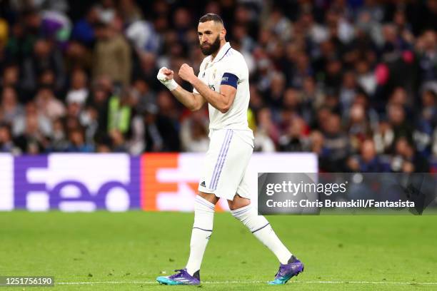 Karim Benzema of Real Madrid celebrates scoring a goal to make the score 1-0 during the UEFA Champions League Quarterfinal first leg match between...