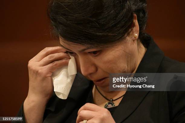 Maria Castillo wipes her tears during a hearing on her son Kendrick Castillo's case against STEM School Highlands Ranch at Douglas County Courthouse...