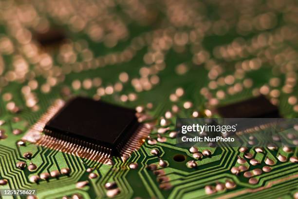 Microchips are seen in this illustration photo taken in Krakow, Poland on April 12, 2023.