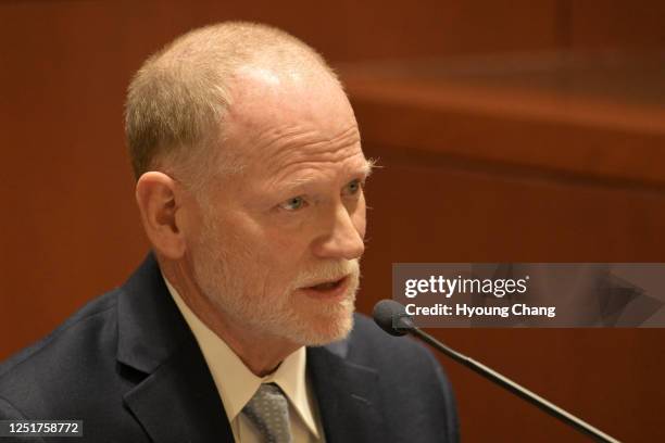 Michael Davis, father of Claire Davis who was shot and killed Arapahoe High School, testifies during a hearing on Kendrick Castillo's case against...