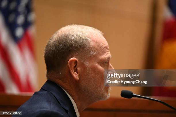 Michael Davis, father of Claire Davis who was shot and killed Arapahoe High School, testifies during a hearing on Kendrick Castillo's case against...