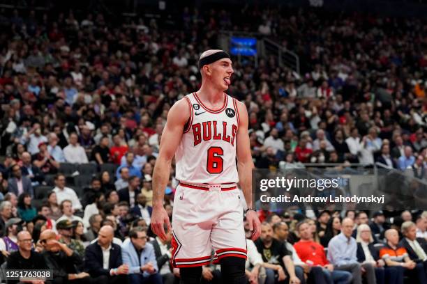 Alex Caruso of the Chicago Bulls reacts against the Toronto Raptors during the 2023 Play-In Tournament at the Scotiabank Arena on April 12, 2023 in...