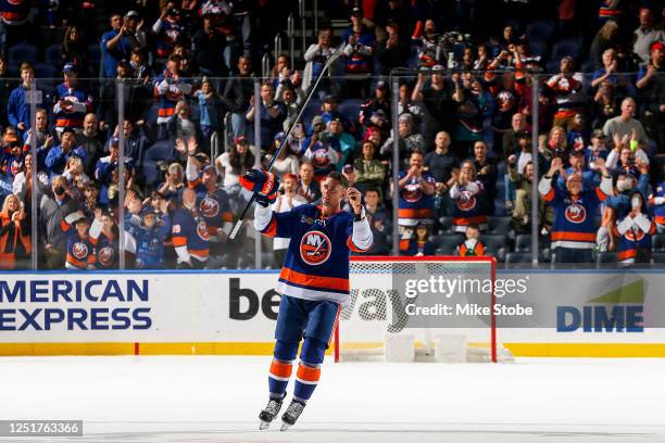 Brock Nelson of the New York Islanders salutes the crowd after being named the first star in the 4-2 victory against the Montreal Canadiens to secure...