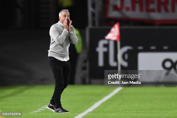 Lucas Pusineri coach of Atletico Tucuman shouts instructions to his players from the sidelines during a Liga Profesional 2023 match between...