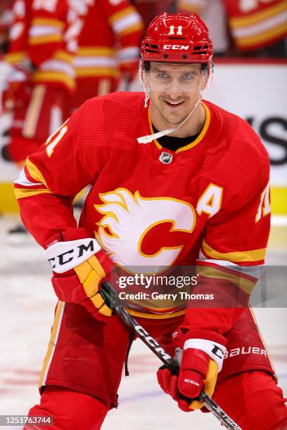 Mikael Backlund of the Calgary Flames is all smiles during warmup prior to the game against the San Jose Sharks at Scotiabank Saddledome on April 12,...