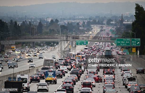 Traffic on a Los Angeles freeway during the evening rush hour commute on April 12, 2023 in Alhambra, California. - US President Joe Biden's...