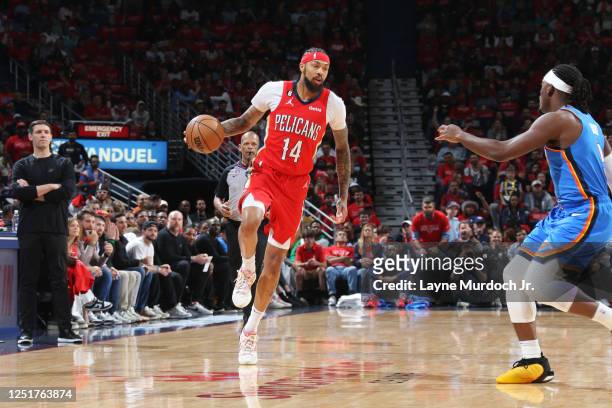 Brandon Ingram of the New Orleans Pelicans dribbles the ball during the game against the Oklahoma City Thunder during the 2023 Play-In Tournament on...