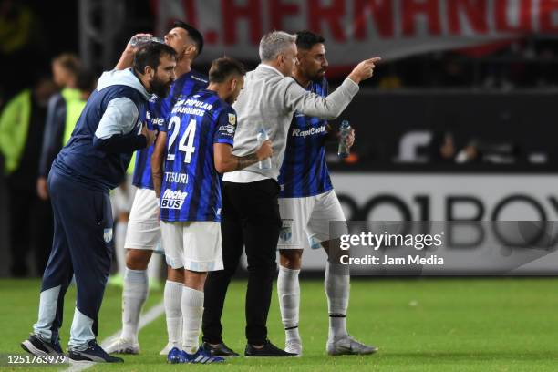 Lucas Pusineri coach of Atletico Tucuman gives instructions to his players from the sidelines during a Liga Profesional 2023 match between...