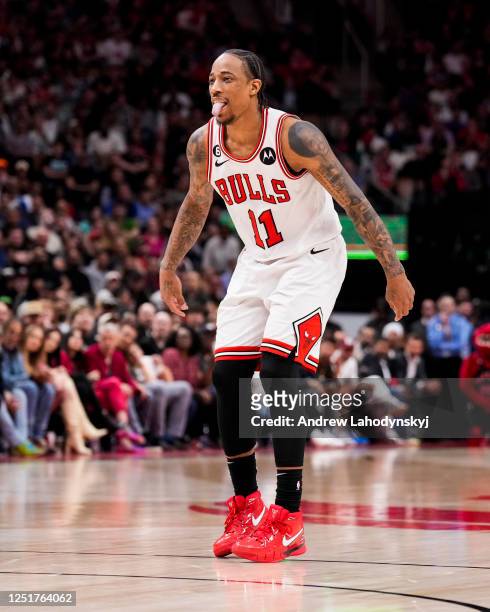 DeMar DeRozan of the Chicago Bulls reacts after scoring against the Toronto Raptors during the 2023 Play-In Tournament at the Scotiabank Arena on...
