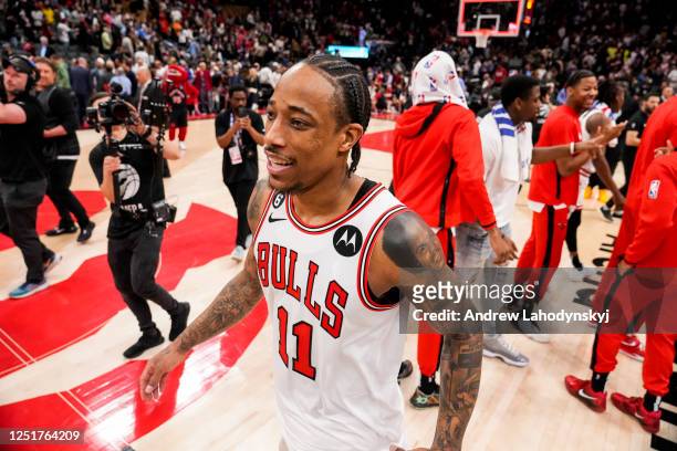 DeMar DeRozan of the Chicago Bulls celebrates after defeating the Toronto Raptors during the 2023 Play-In Tournament at the Scotiabank Arena on April...