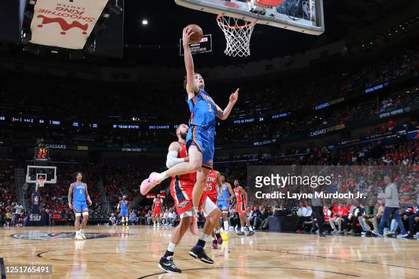 Josh Giddey of the Oklahoma City Thunder drives to the basket during the game against the New Orleans Pelicans during the 2023 Play-In Tournament on...