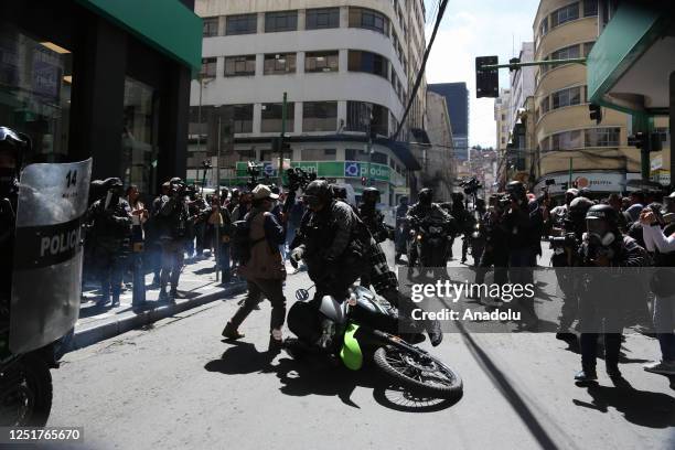 Police motorcycle crashes during a day of clashes between teachers and police officers in La Paz, Bolivia on April 12, 2023. Hundreds of national...